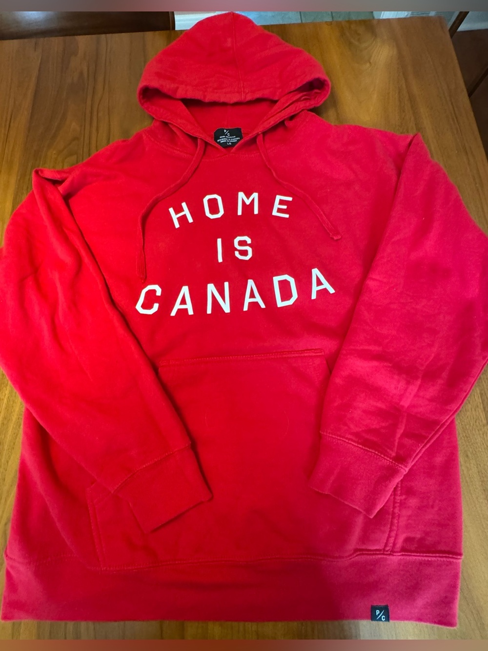 Unisex Peace Collective Classic ‘Home is Canada’ Hoodie in Bright Red, Size L